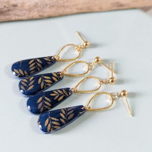 Blue and Gold leaves seeds and tears - Seed shape earrings - midnight blue clay with gold leaf pattern, high gloss