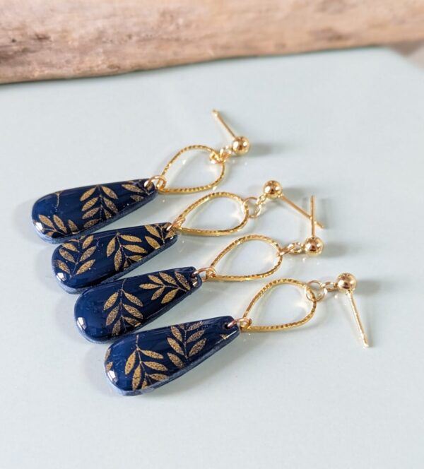 Blue and Gold leaves seeds and tears - Seed shape earrings - midnight blue clay with gold leaf pattern, high gloss
